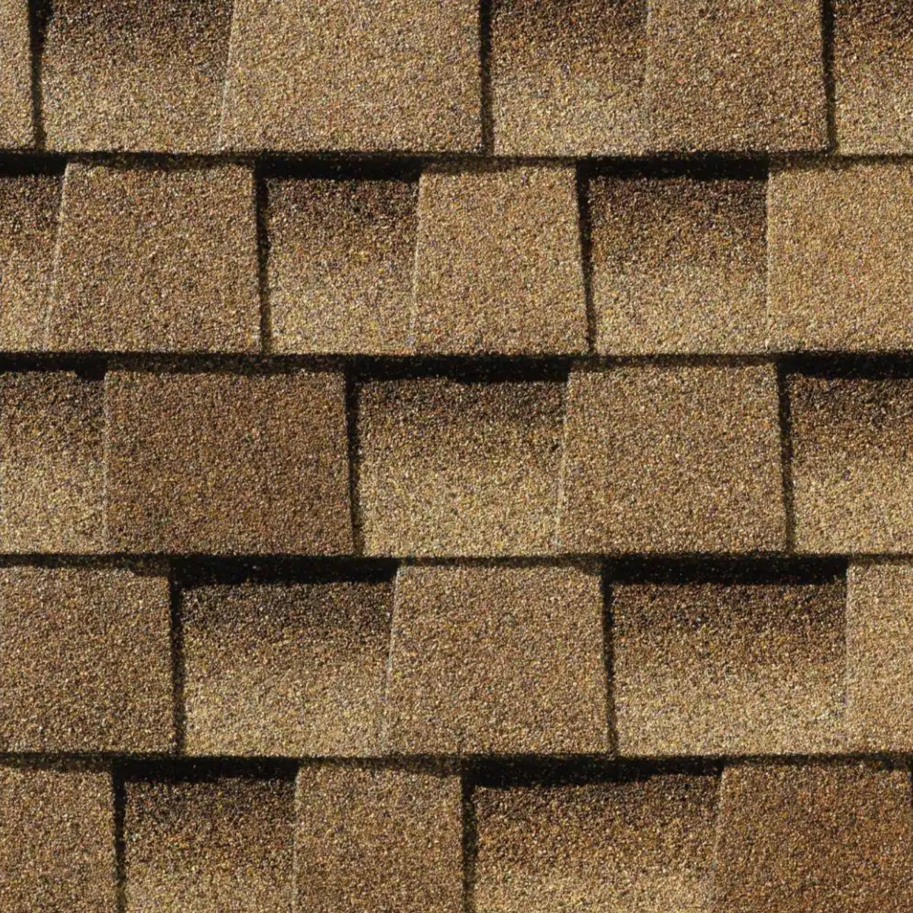Close-up of GAF Timberline HDZ 33.33 sq. ft. Per Bundle Laminated High Definition Shingles, showing an overlapping installation with a textured brown and tan surface and GAF’s LayerLock Technology for enhanced durability.
